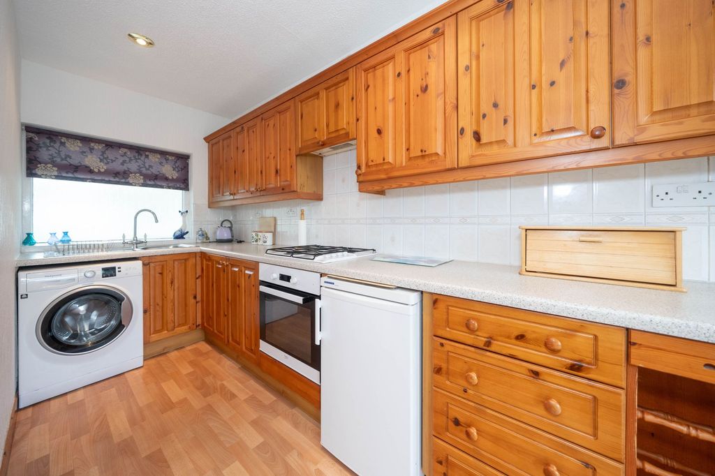 Property photo 3 of 26 Kitchen - View To The Front