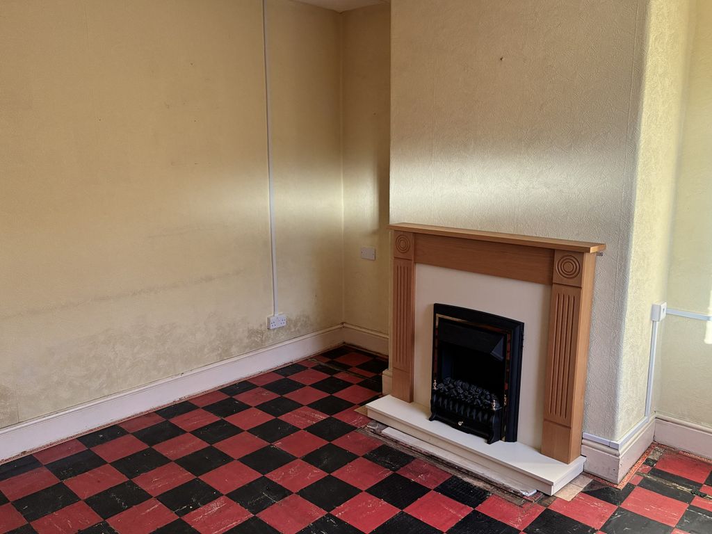 Property photo 2 of 12 Living Room 1