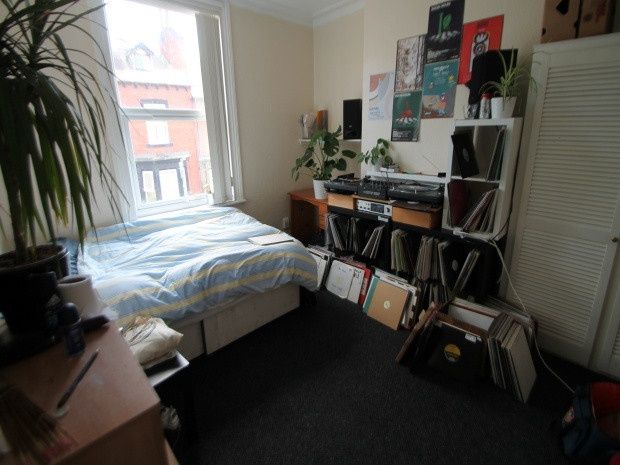 Property photo 2 of 12 A Cozy Living Space Featuring A Bed, Desk Area, An...