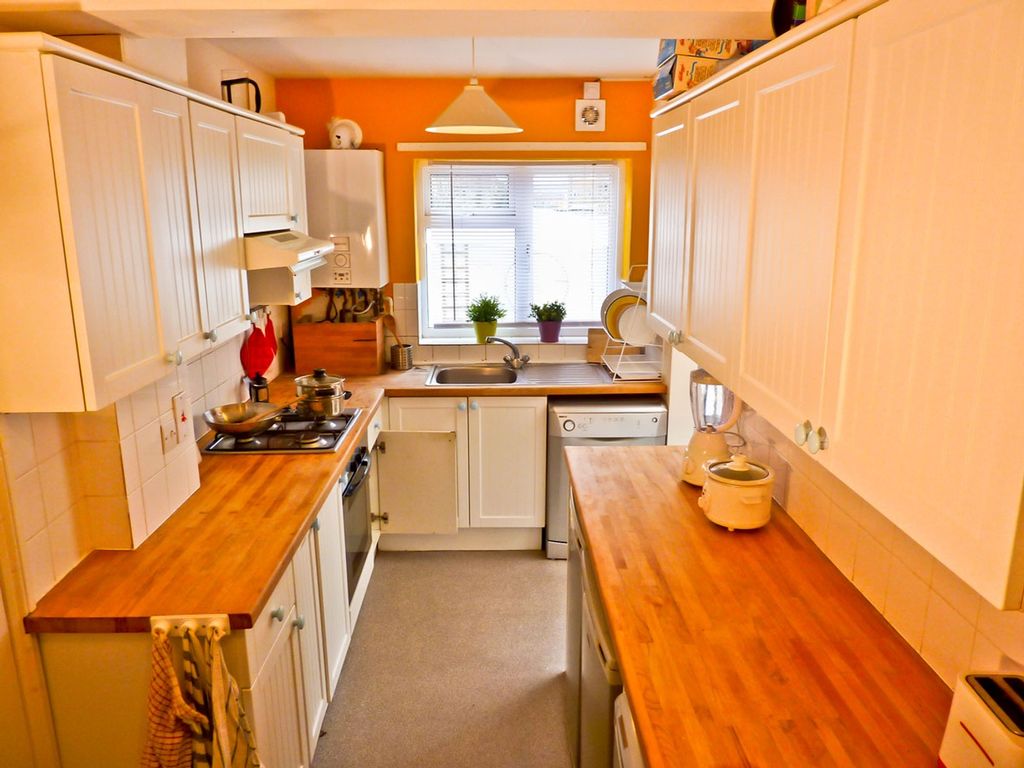 Property photo 1 of 6 A Bright And Modern Kitchen Featuring Ample Counte...