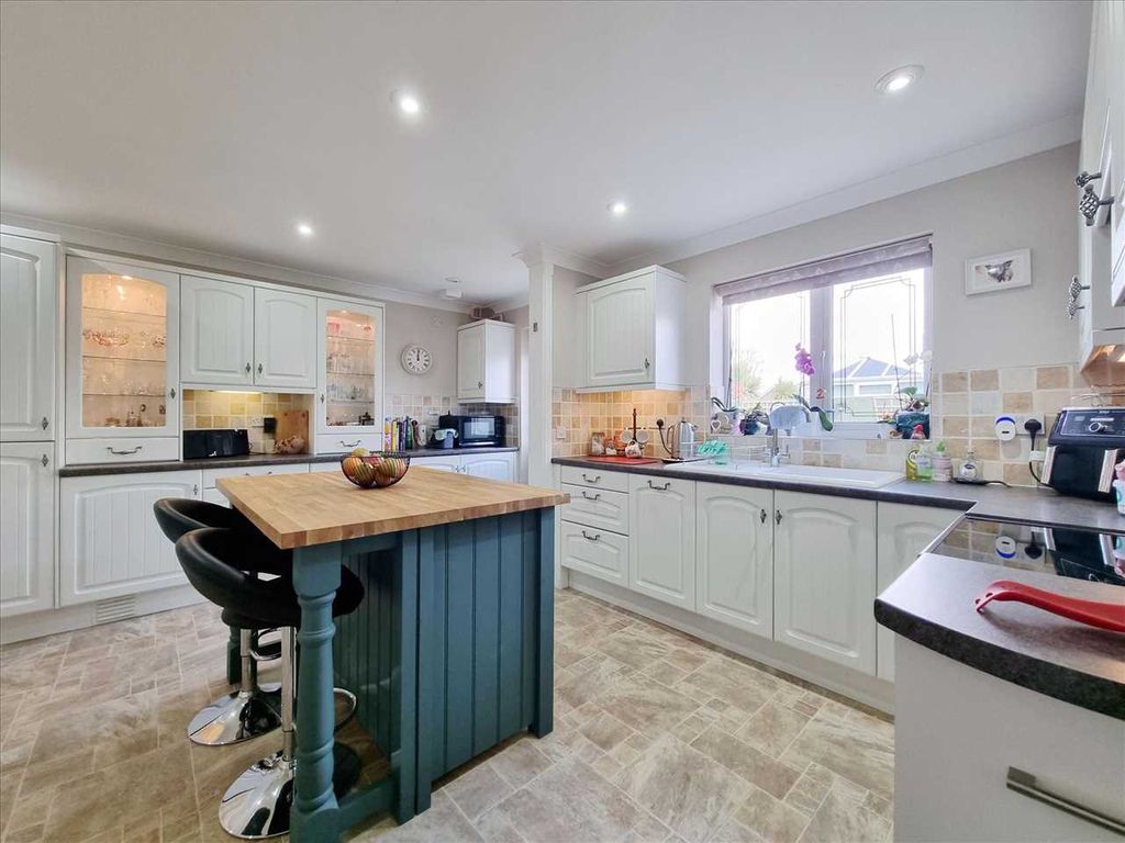 Property photo 2 of 15 Dining Kitchen: