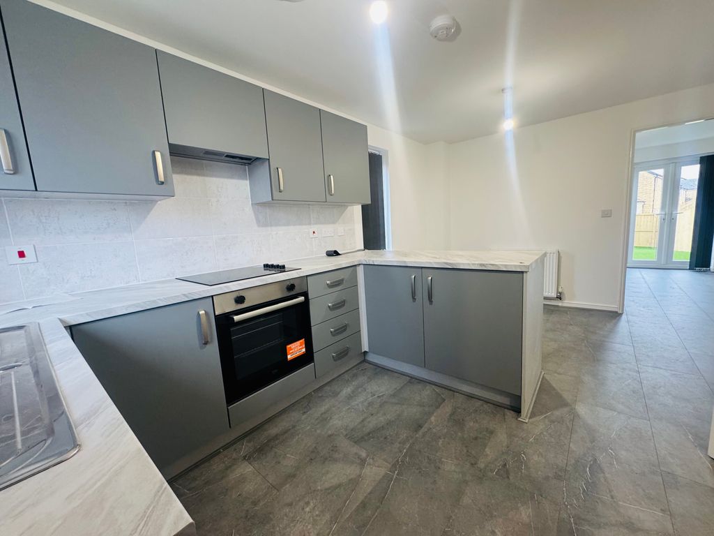 Property photo 2 of 12 Kitchen