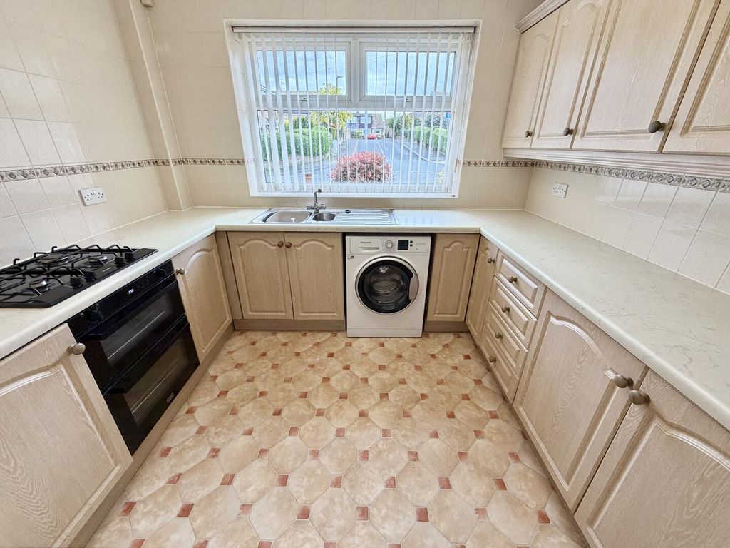 Property photo 2 of 12 Kitchen