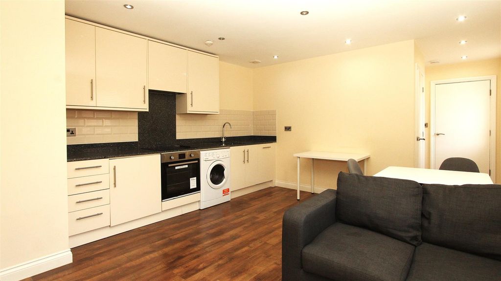 Property photo 1 of 6 Modern Open-Plan Kitchen With Sleek Appliances...