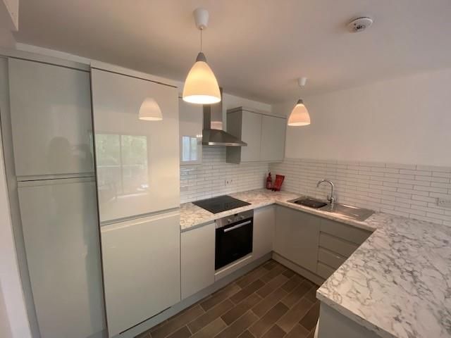 Property photo 3 of 16 Kitchen