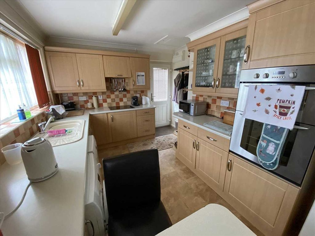 Property photo 2 of 13 Breakfast Kitchen: