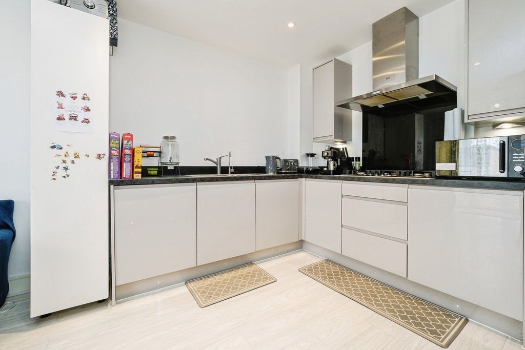 Property photo 2 of 17 Kitchen Area