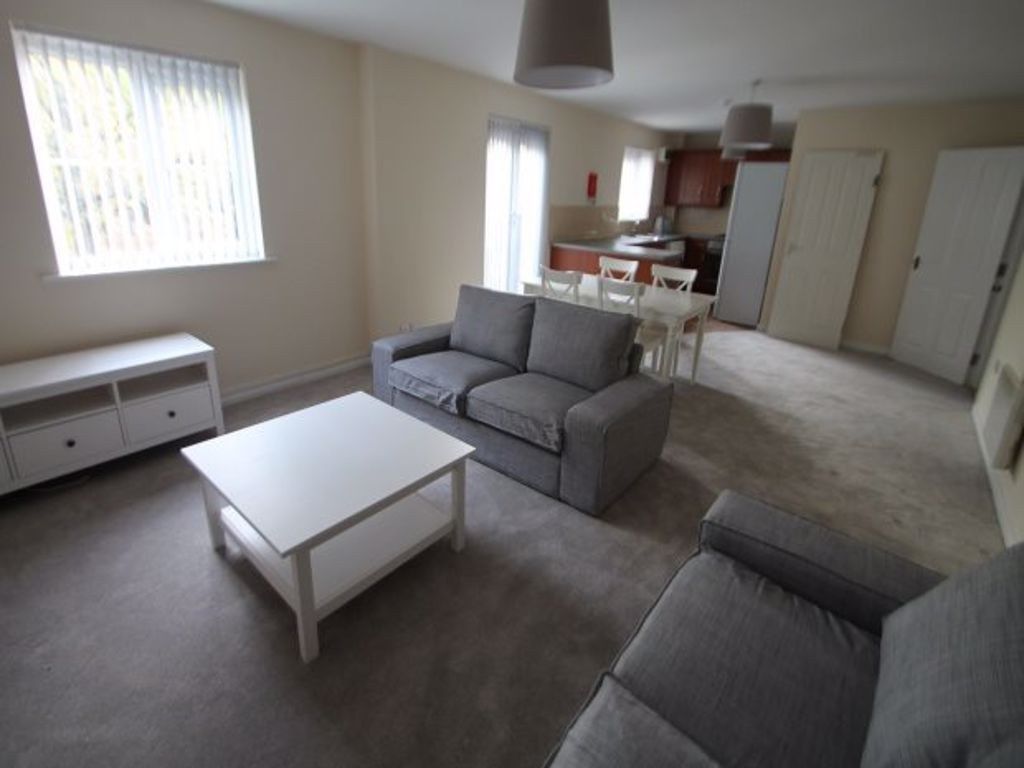 Property photo 3 of 11 Bright, Carpeted Living Room With Matching Grey So...