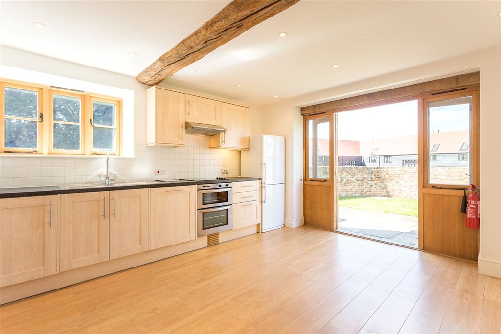 Property photo 3 of 12 Kitchen