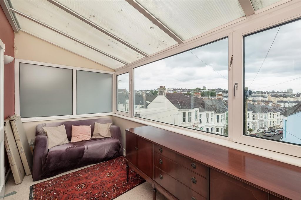 Property photo 3 of 12 Sun Room