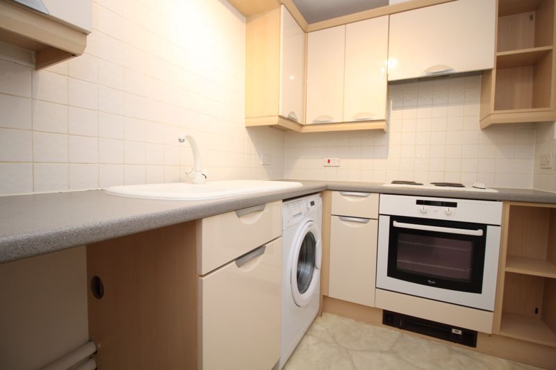 Property photo 3 of 11 Kitchen