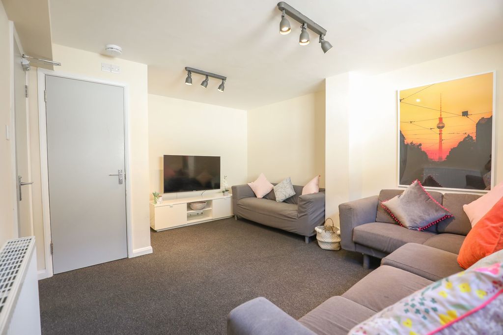 Property photo 3 of 4 Bright And Tidy Living Room Featuring Comfortable ...