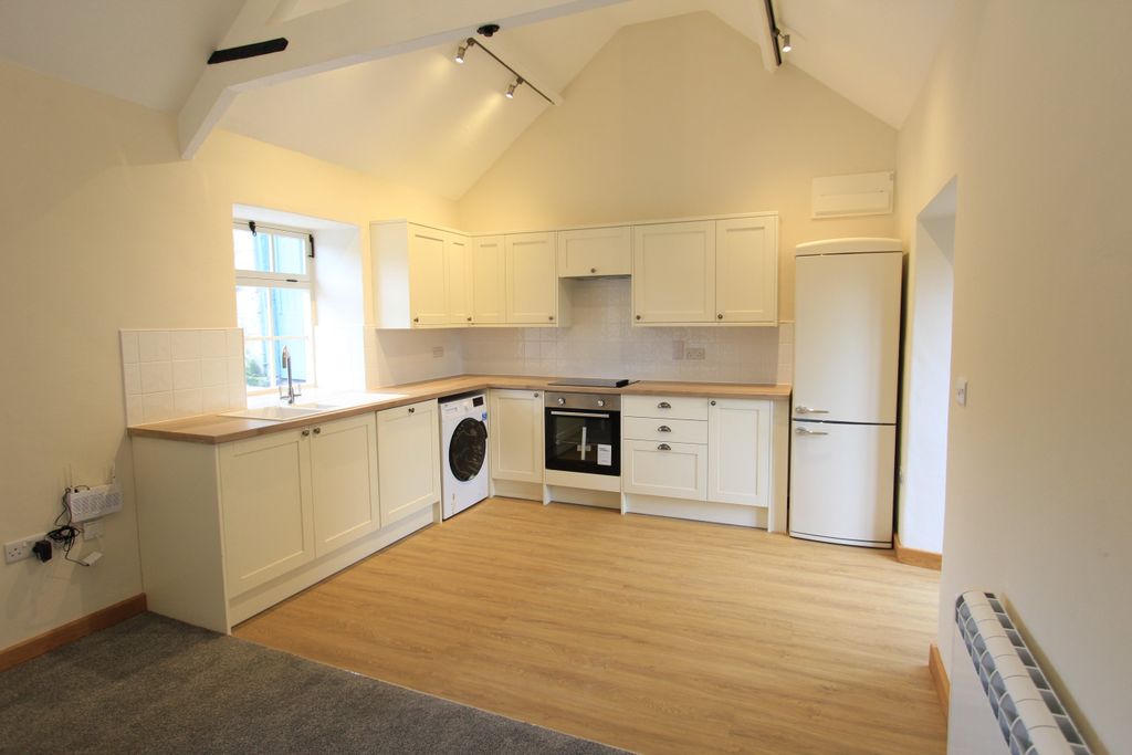 Property photo 3 of 7 Kitchen Area