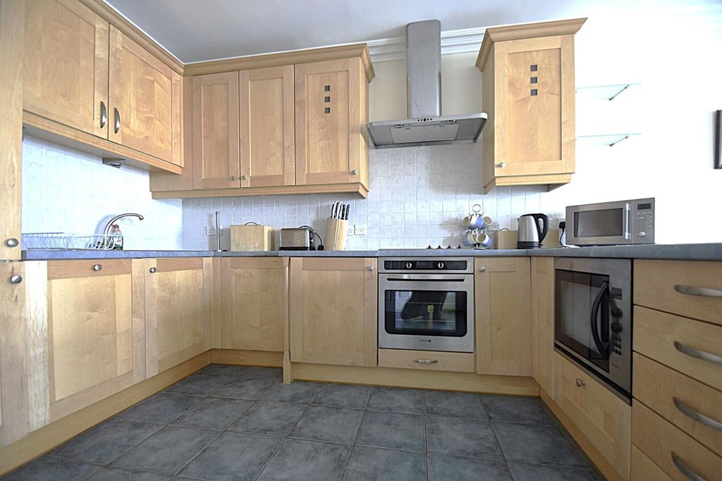 Property photo 2 of 12 Kitchen