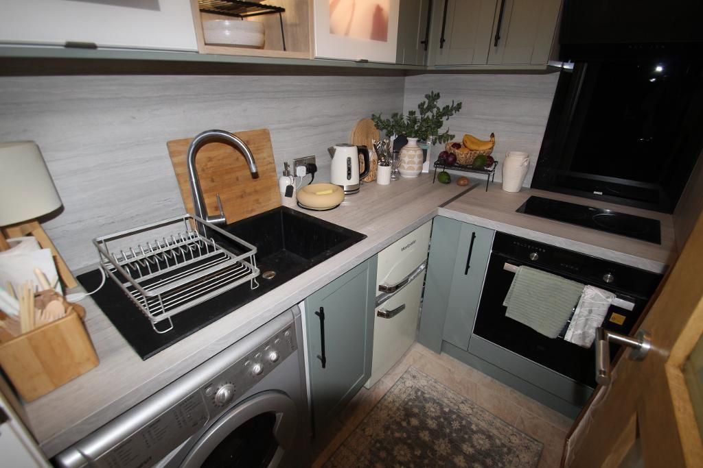 Property photo 2 of 8 Kitchen