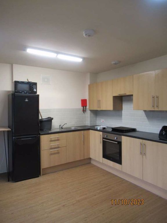 Property photo 3 of 6 Kitchen Area