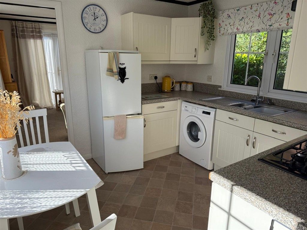 Property photo 1 of 8 Kitchen