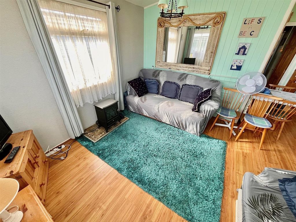 Property photo 2 of 13 Living Room Area