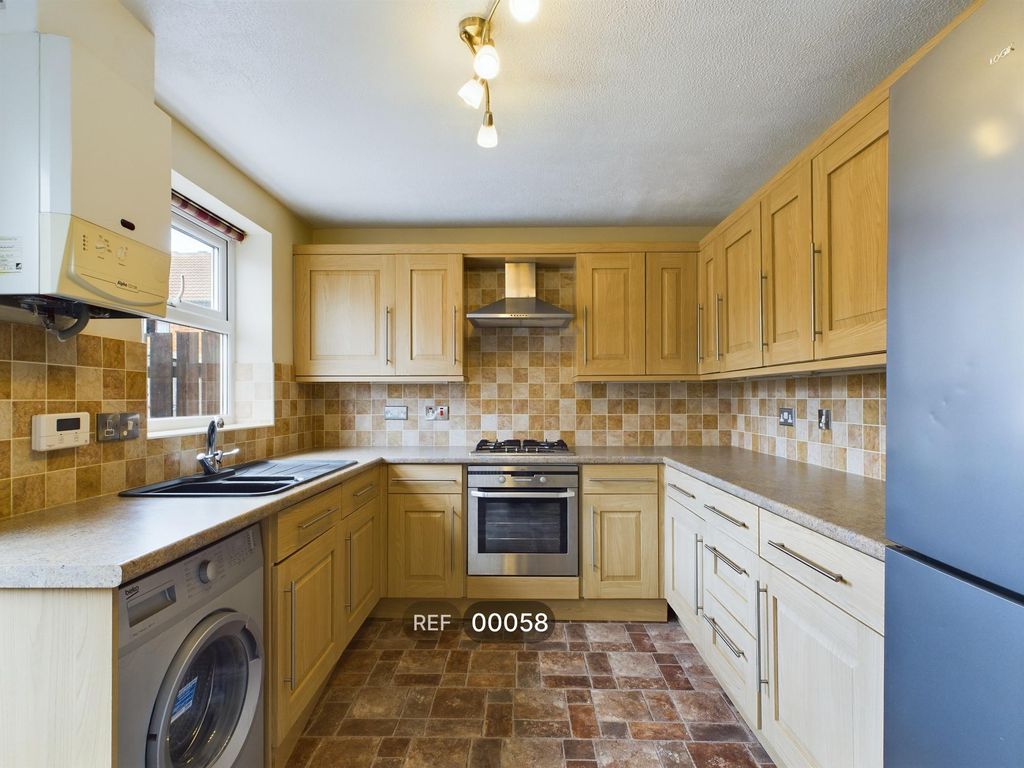 Property photo 2 of 12 Kitchen