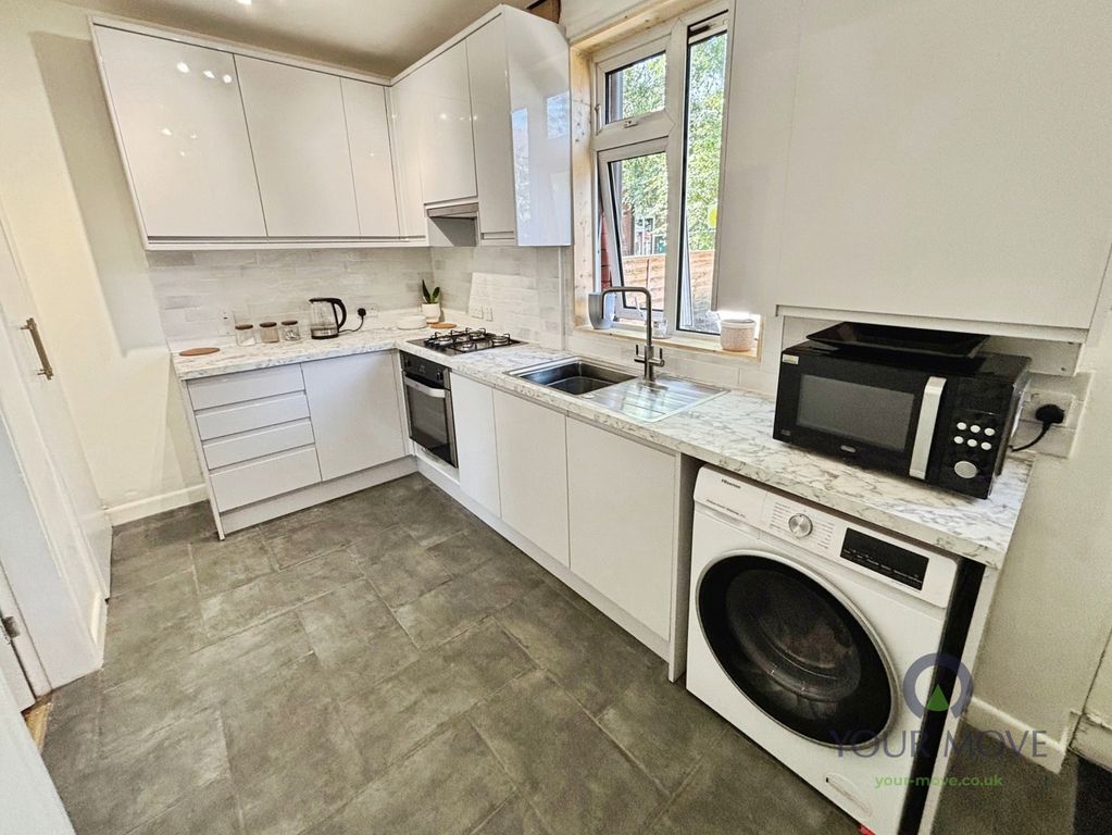 Property photo 3 of 13 Kitchen