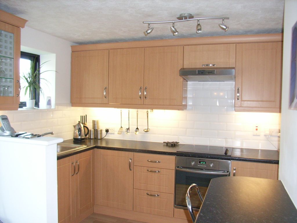Property photo 3 of 8 Kitchen Area