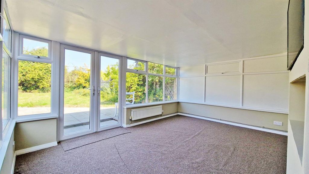 Property photo 2 of 16 Sun Room