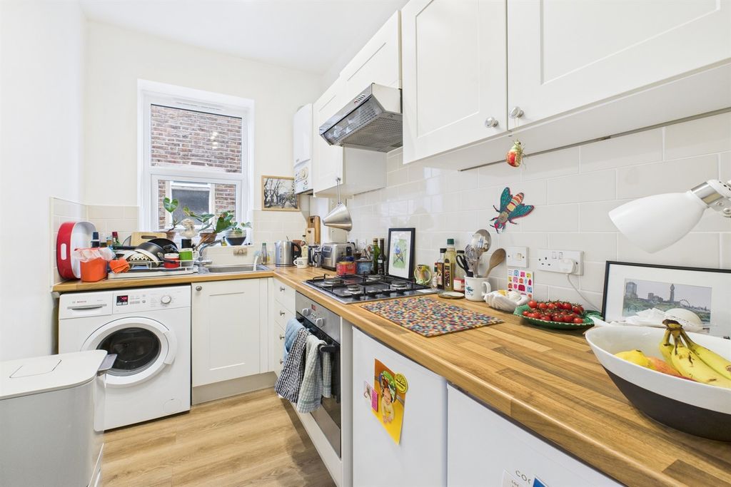 Property photo 3 of 12 Kitchen