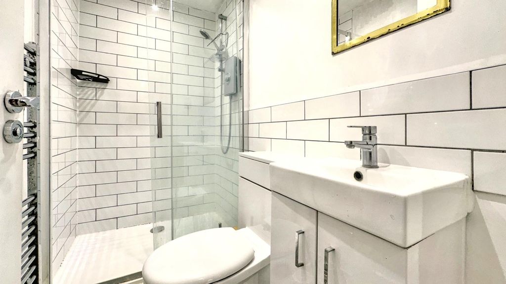 Property photo 3 of 5 Modern Bathroom With Stylish Subway Tiles...