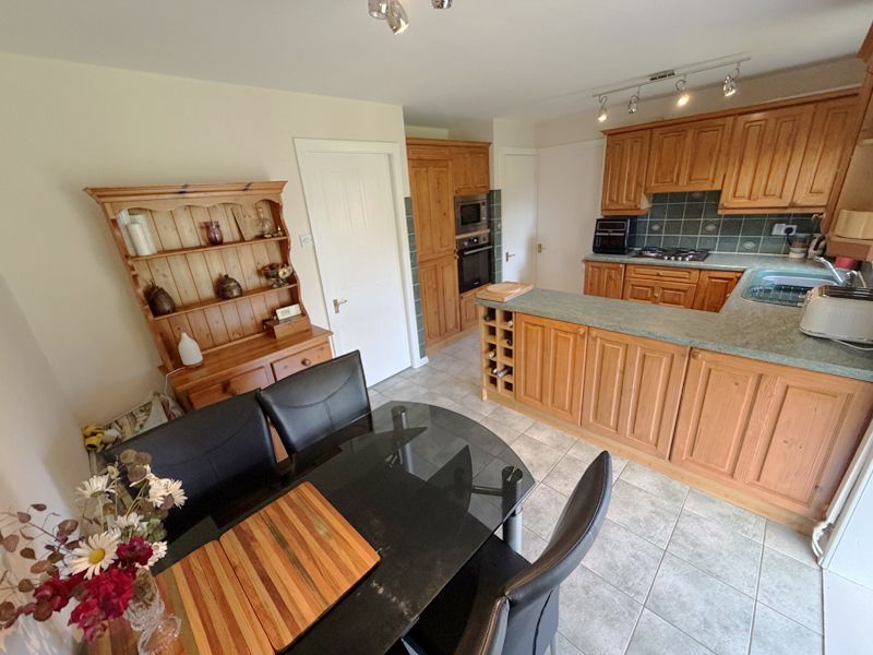 Property photo 3 of 34 Dining Kitchen