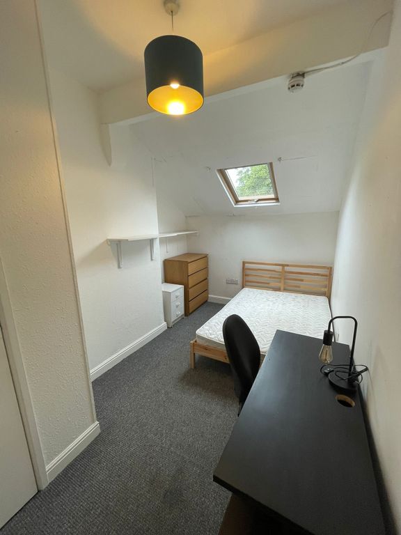 Property photo 1 of 11 A Spacious And Well-Lit Double Bedroom Featuring A...