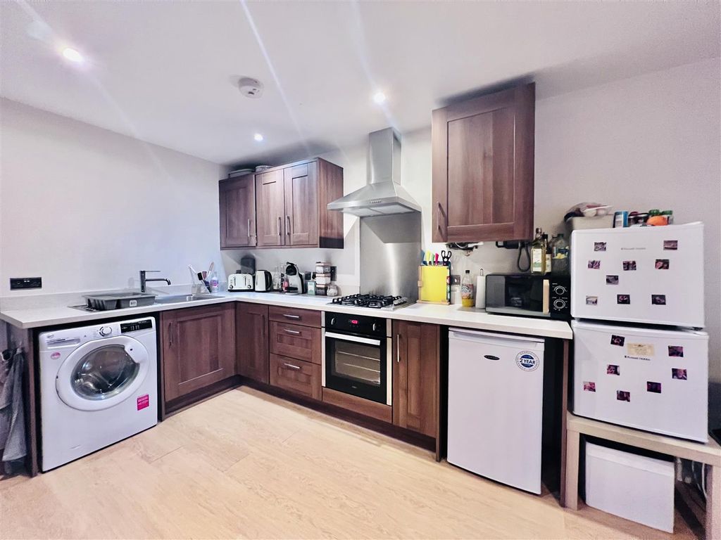 Property photo 3 of 10 Kitchen Area