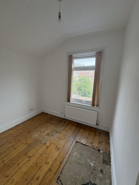 Property photo 3 of 7 Rear Bedroom