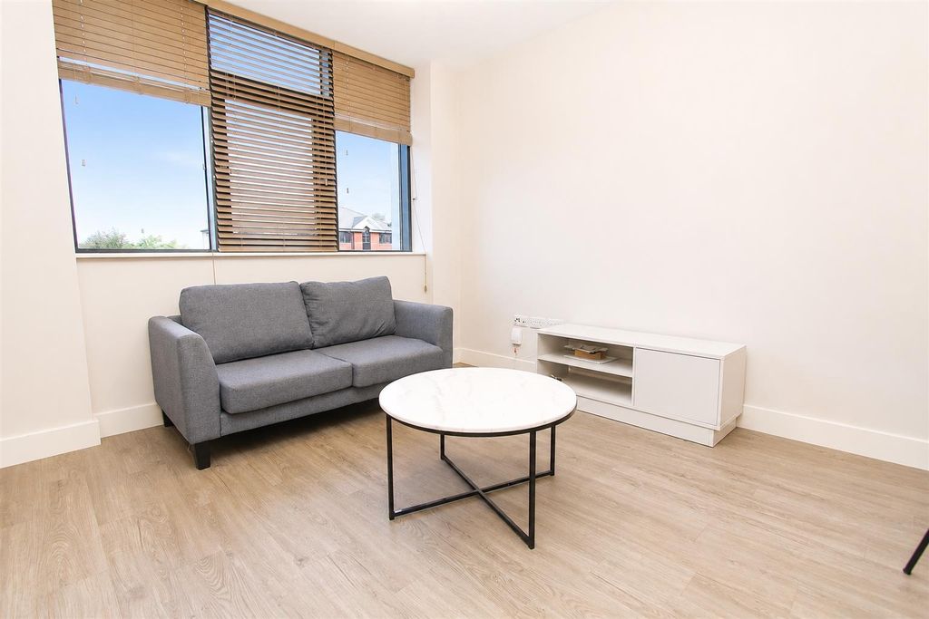 Property photo 2 of 7 Bright Living Area With Modern Grey Sofa...