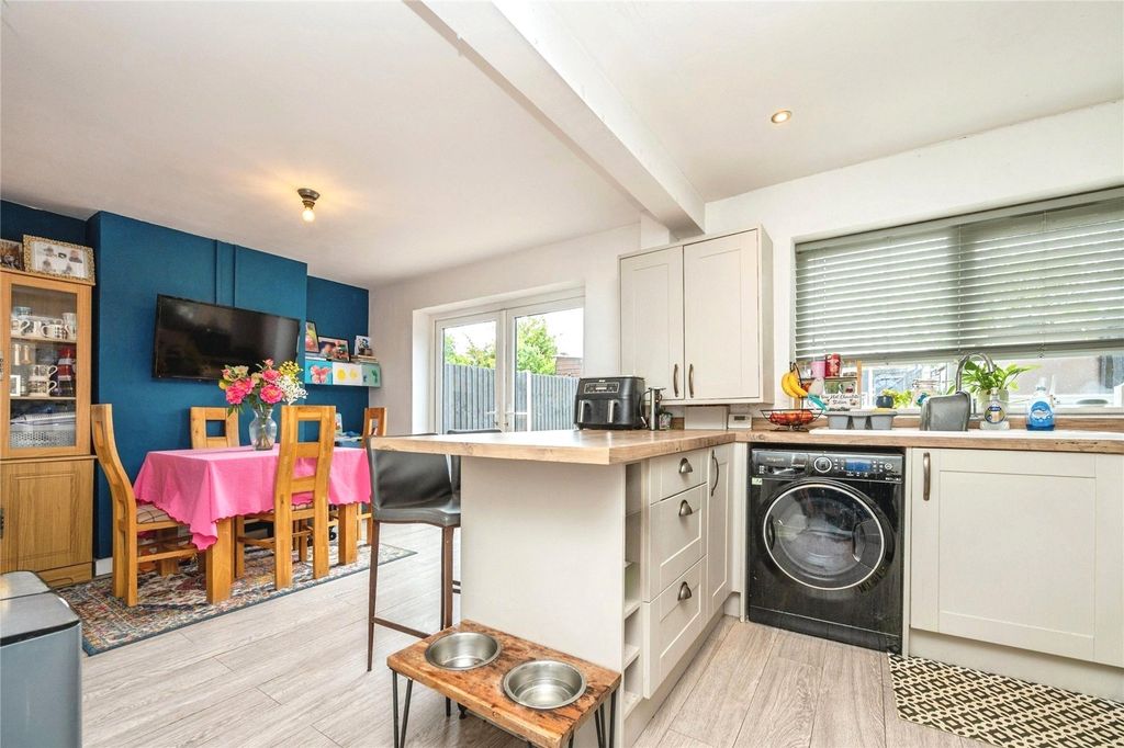 Property photo 3 of 16 Dining Kitchen