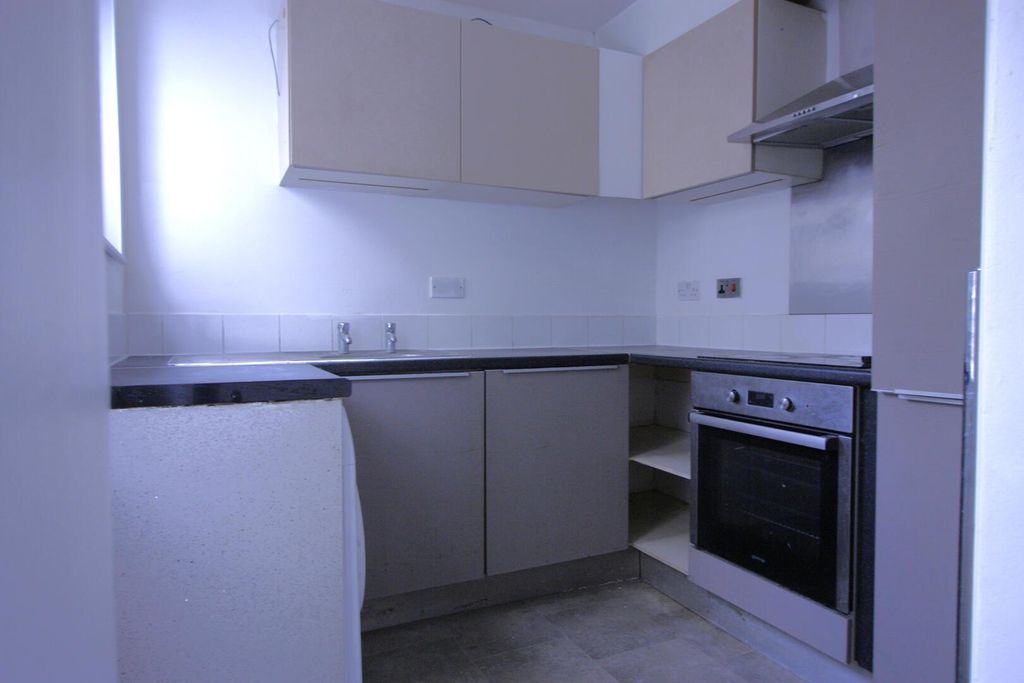 Property photo 3 of 12 Kitchen