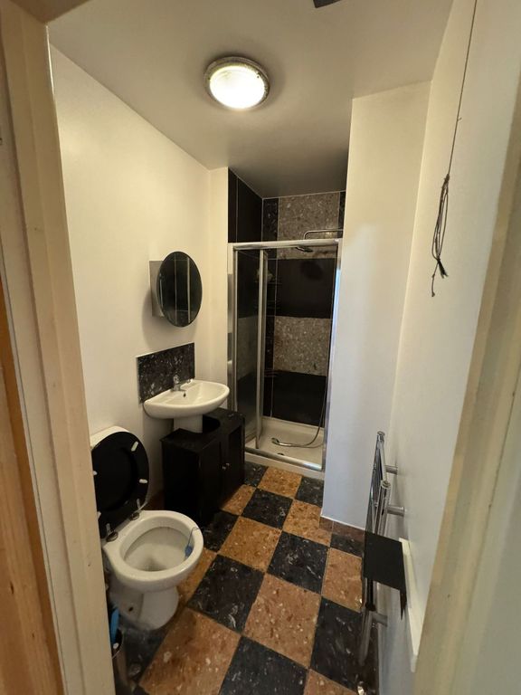 Property photo 2 of 4 Modern Bathroom With Stylish Checkered Tiling...