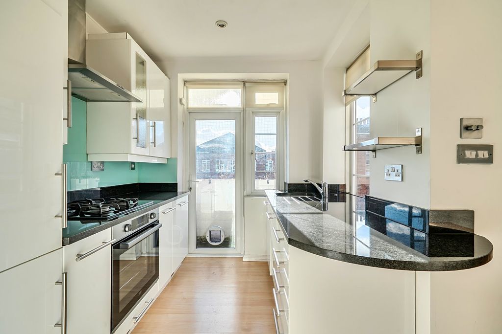 Property photo 3 of 8 Kitchen