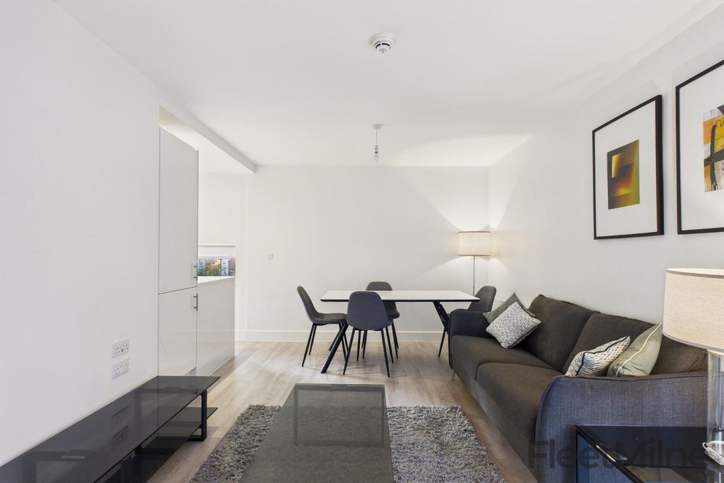 Property photo 3 of 11 Living Room/Dining Area