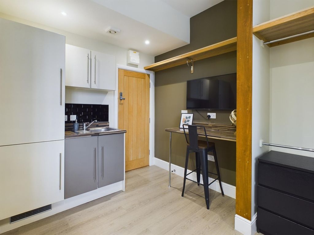 Property photo 2 of 7 A Modern Kitchenette With A Sleek Design And Ample...