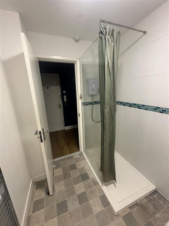 Property photo 3 of 7 Bright Bathroom With A Large Walk-In Shower...