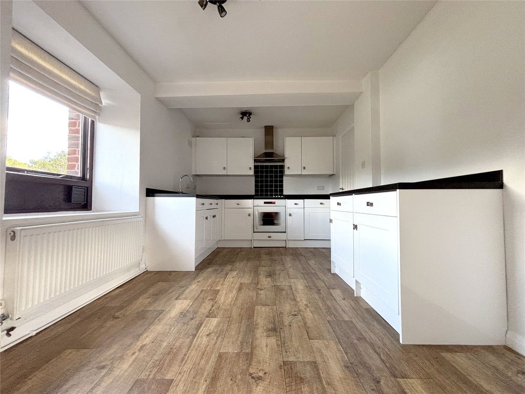 Property photo 3 of 12 Kitchen