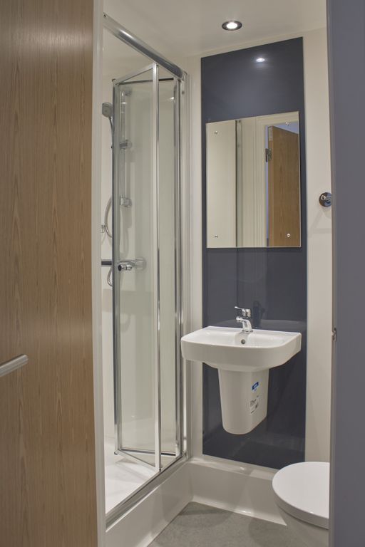 Property photo 3 of 3 A Modern And Pristine Bathroom Featuring A Sleek S...