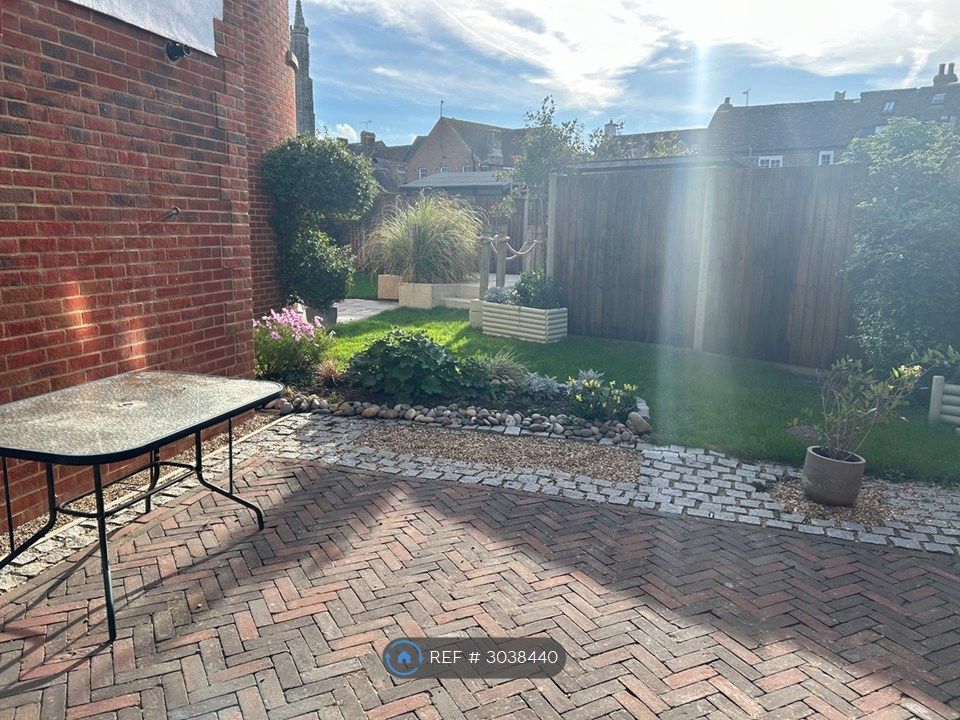 Property photo 3 of 13 Side Patio From Utility Room And Access To Garage