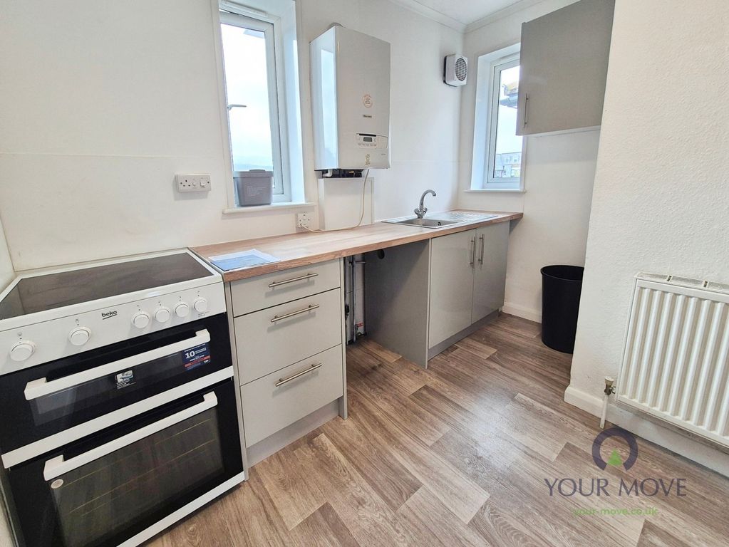Property photo 3 of 7 Kitchen