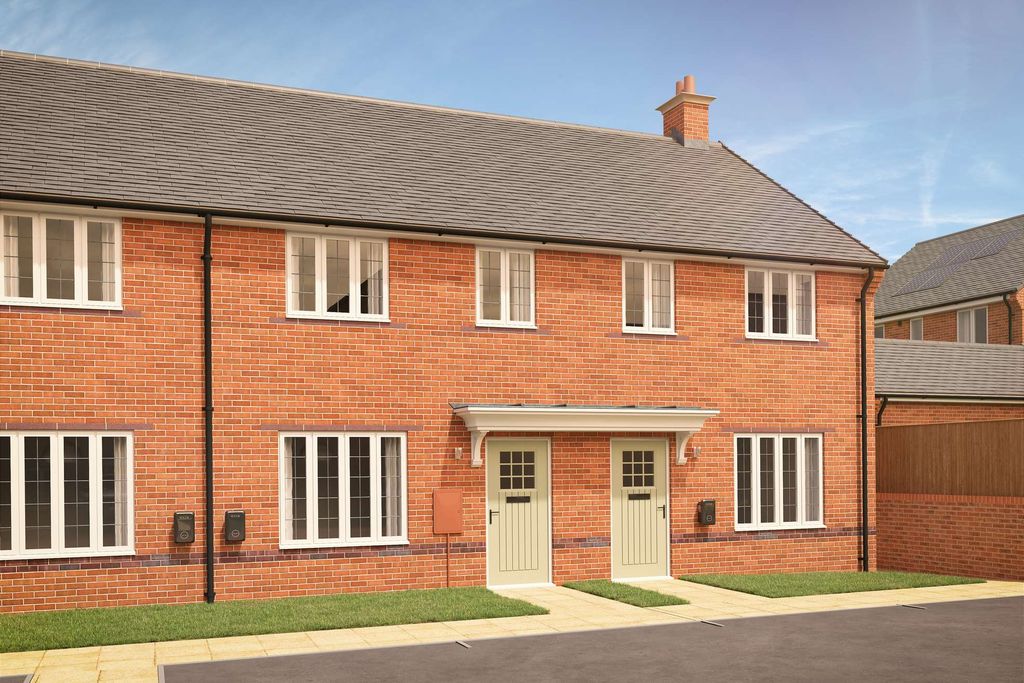 Property photo 1 of 8 Two Identical Brick Townhouses With White-Framed Windows And Light Green Doors Stand On A Paved Walk