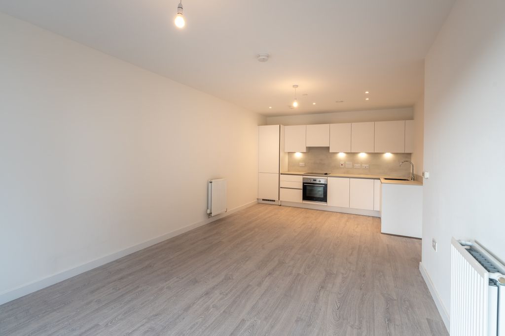 Property photo 3 of 11 Kitchen &amp; Living Area