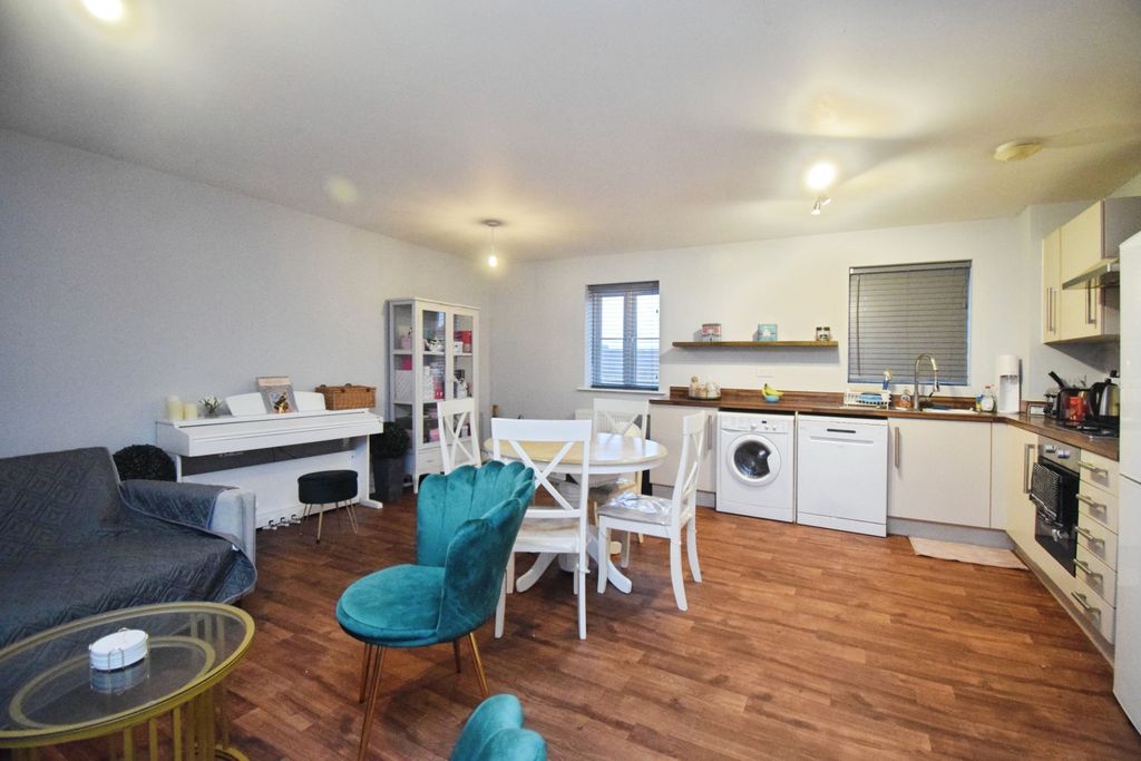 Property photo 2 of 9 Living Area