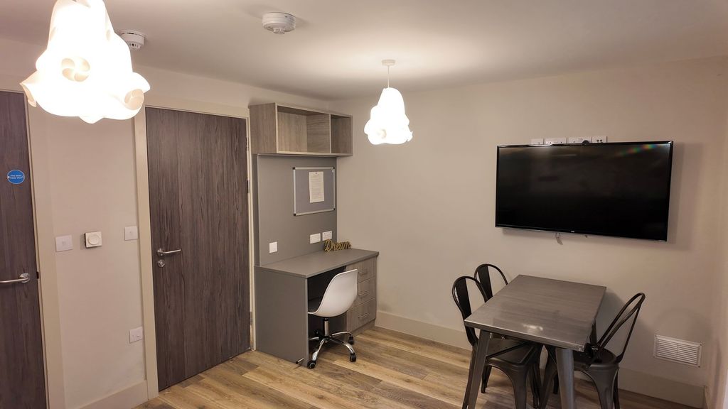 Property photo 3 of 9 Bright, Modern Communal Lounge With A Wall-Mounted...