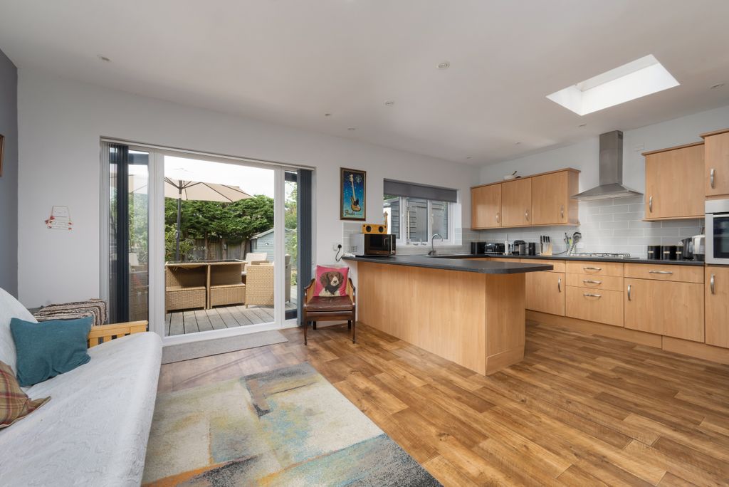 Property photo 3 of 16 Open-Plan Kitchen