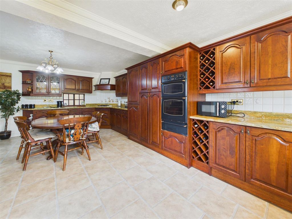 Property photo 2 of 13 Dining Kitchen